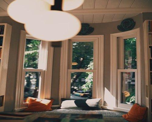 A cozy reading corner in a home with soft natural lighting